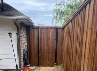 Dark Wood Fence Near House
