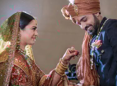 Bride and groom holding hands.