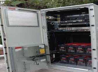 a large open door with a lot of electronics inside