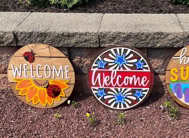 laser cut and colorfully painted wooden door or wall hangers