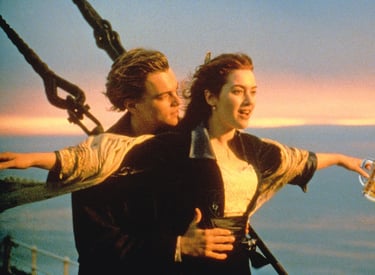 a man and woman are holding beer glasses