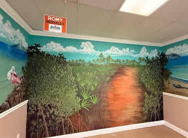 A colorful stunning realistic three wall mural featuring Florida nature, wildlife and sandy beaches by Kathy LaFollett.