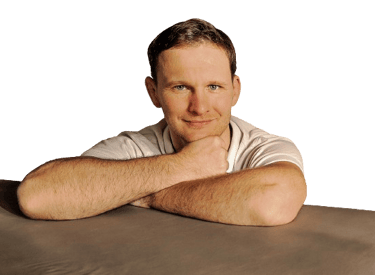 a massage therapist with a white shirts