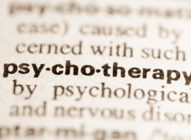 Eine Nahaufnahme von einem Wörterbuch von Psychotherapie