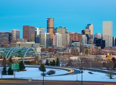 Downtown Denver skyline during winter, showcasing SparkEaseCleaning service area