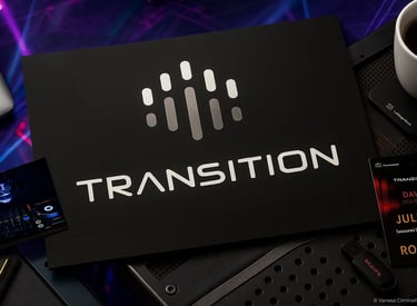 a laptop computer sitting on a desk with a laptop and a cup of coffee