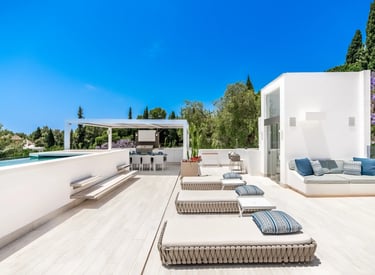 Villa Serenity rooftop with loungers and sweeping sea views