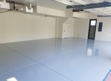 Solid color epoxy floor in 3 car garage
