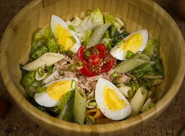 Food Photography - a bowl of food with eggs, tomatoes, and eggs