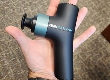 Compact and portable massage gun for quick muscle relief