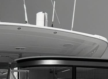 a boat with a flag on it and a flag on the side