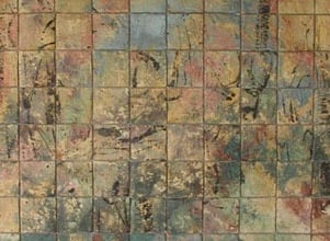 a bathroom with a toilet and a toilet paper towel