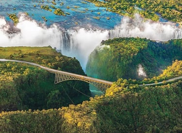 Rovos Rail luxury train in South Africa passing through scenic landscapes.