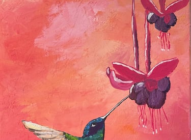 warm and inviting hummingbird painting from a paint and sip in cozumel
