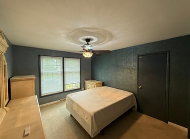This project we did the whole bedroom, wallpaper in the back walls, new paint on the walls and trims