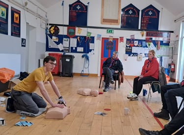 a group of people attending a first aid course