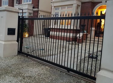 Sliding gates for a driveway