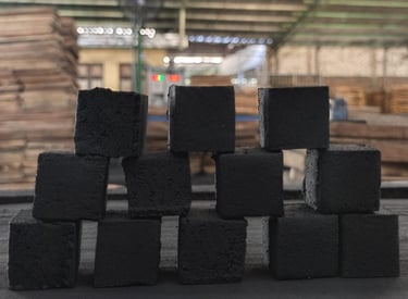 Stack of premium square coconut charcoal briquettes for shisha and BBQ