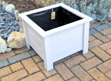 Wooden square planter on legs painted in white colour made from quality wood