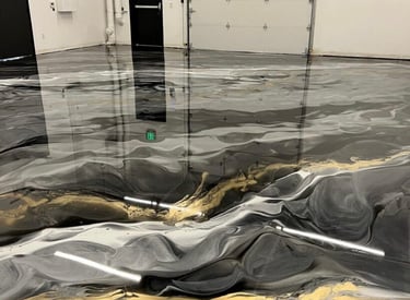 High-gloss metallic epoxy floor in a shop