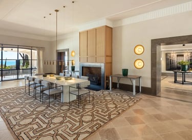 Lounge with patterned floor and dining area at Villa La Gratitud