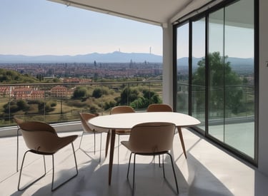 A commercial property featuring two buildings with metal roofs, situated in an industrial area. Several parked vehicles, including vans and cars, are seen near the buildings. The surroundings are well-maintained with greenery and clear weather with blue skies and clouds in the background.