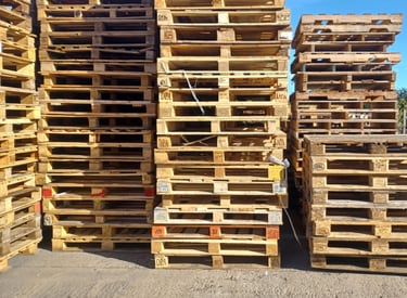 Pallets stacked up needing repair