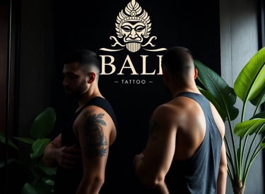 a man with tattoos on his chest and a tattoo on his chest
