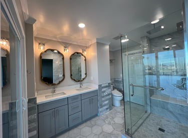 Bathroom renovation with modern finishes by Asha Construction