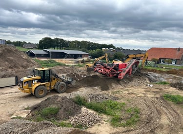 a tractor with a loader on a construction site