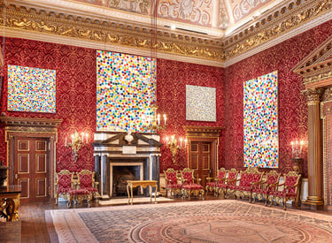 Damien Hirst spot paintings in ornate Houghton Hall.