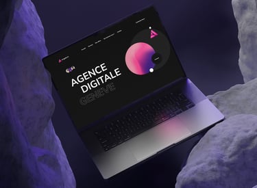 A laptop on a rock displaying the Angelium.ch website