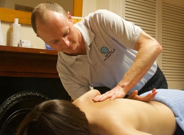 a woman is getting a massage