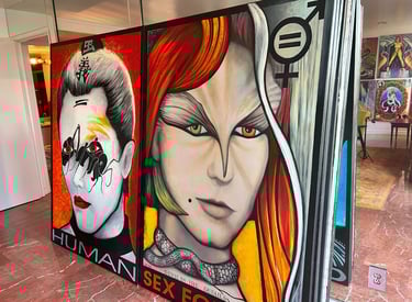 a large painting of a woman with red hair and a man with a white shirt