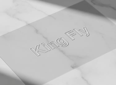 A clear PVC heat-pressed pouch with a perfect embossed King Fly LOGO, showing no stitching lines.