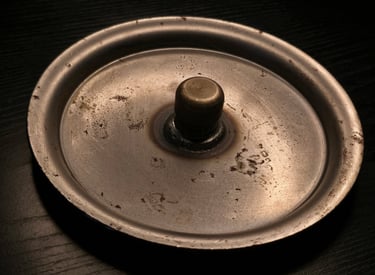 End plate of a shock absorber placed in a dark background