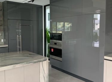a kitchen with a marble counter top 