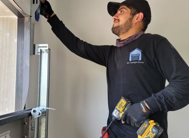 Alejandro upgrading a garage door | On Point Overhead Doors - Kyle, TX