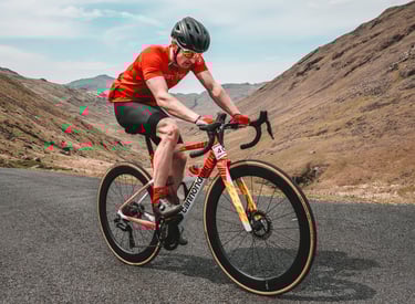 a photo of a road cyclist competing in the fred whitton sportive 