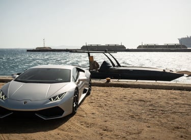 Lambo and boat mykonos port