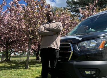 a man standing in front of a van
