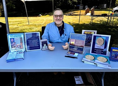 Gary K at Sober Fest MI selling books and raffle tickets