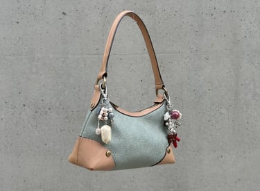 Elegant handbag featuring fun.arc.ik bag charms crafted from pearls and beads, women's accessories