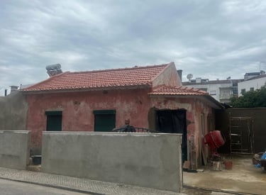 a house with a red roof and a red roof