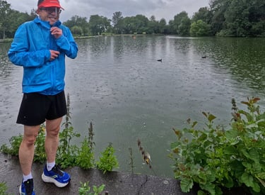 a man in a blue jacket and a red hat