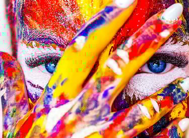 a woman with painted face paint on her face