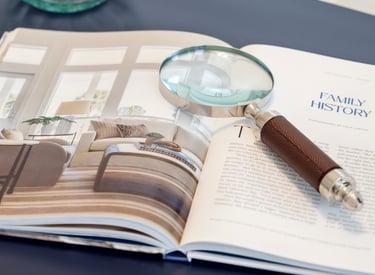 real estate detail image of a magnifying glass on a book about interior photography