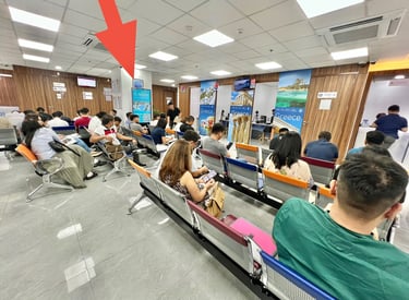 alt="Brand advertisement inside Visa Center waiting area Philippines"