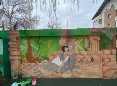 Pictură gard Cartea Junglei Mowgli.