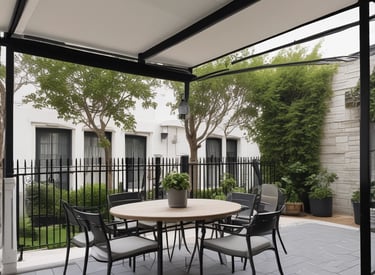 a patio with a black awning and a white awning
